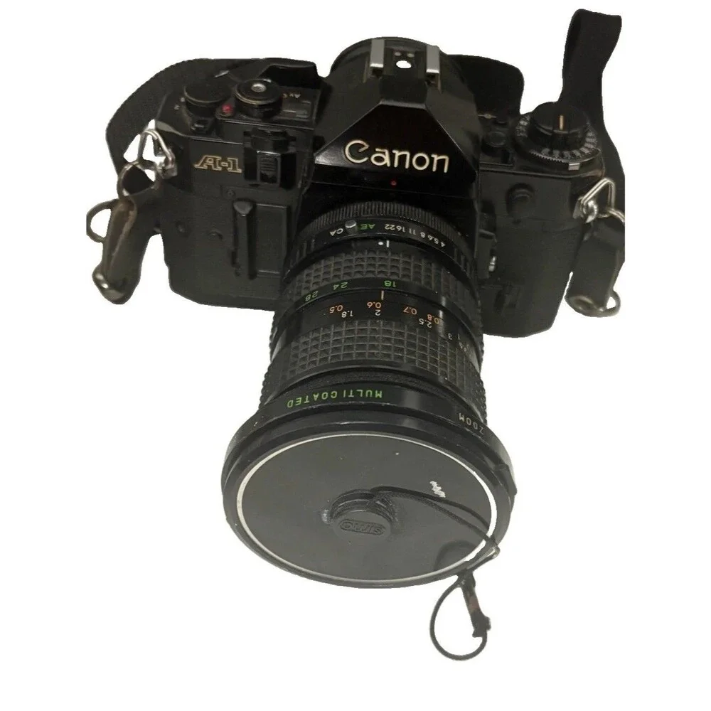 Canon A-1 35mm Film Camera with toyo optics 28mm 1:3.5 Lens and F=28-80  Tested